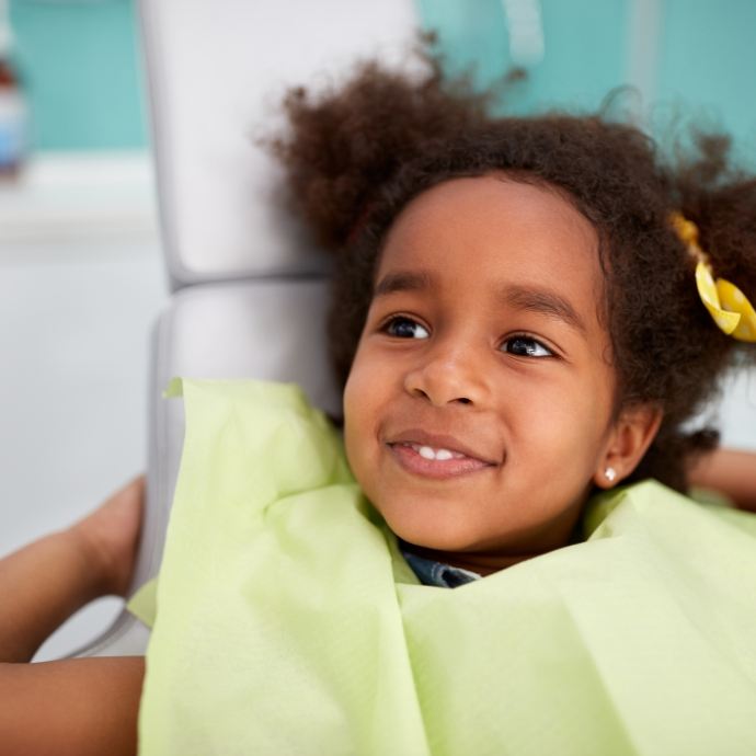 Little girl smiling after pulp therapy