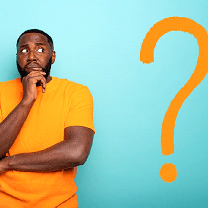 man with orange question mark wondering about dental implants