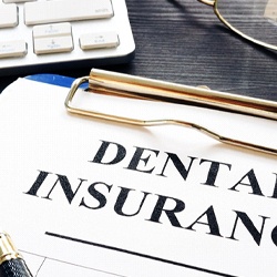 dental insurance form on table