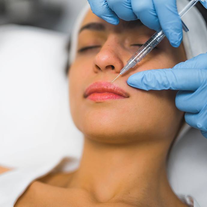 Woman getting dermal fillers