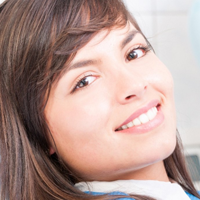Close-up of a female dental patient smiling